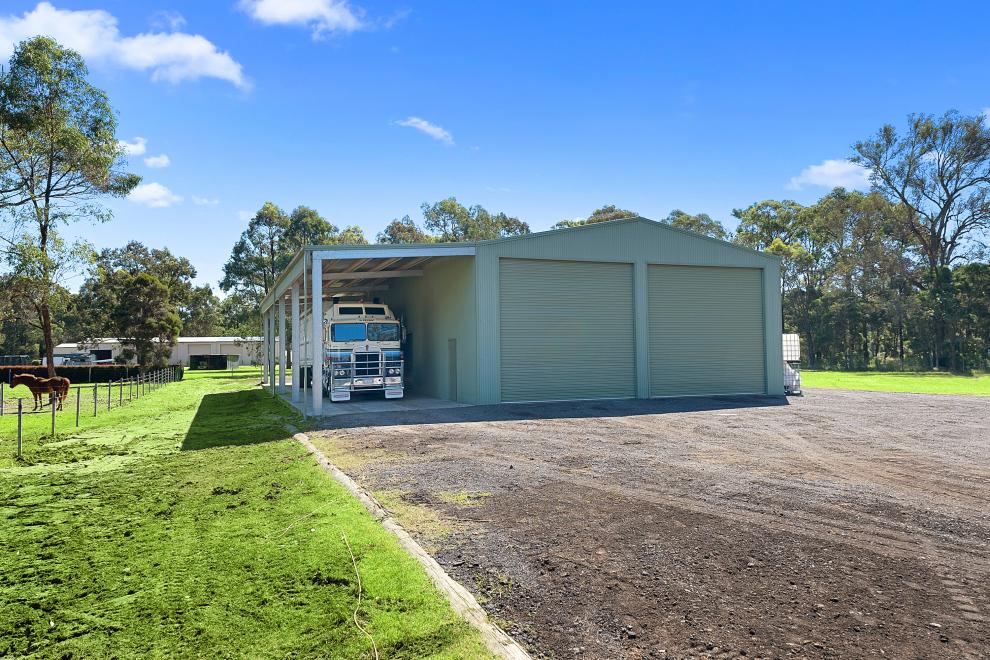 Looking For a Massive Shed on 3.7 Perfect Acres?