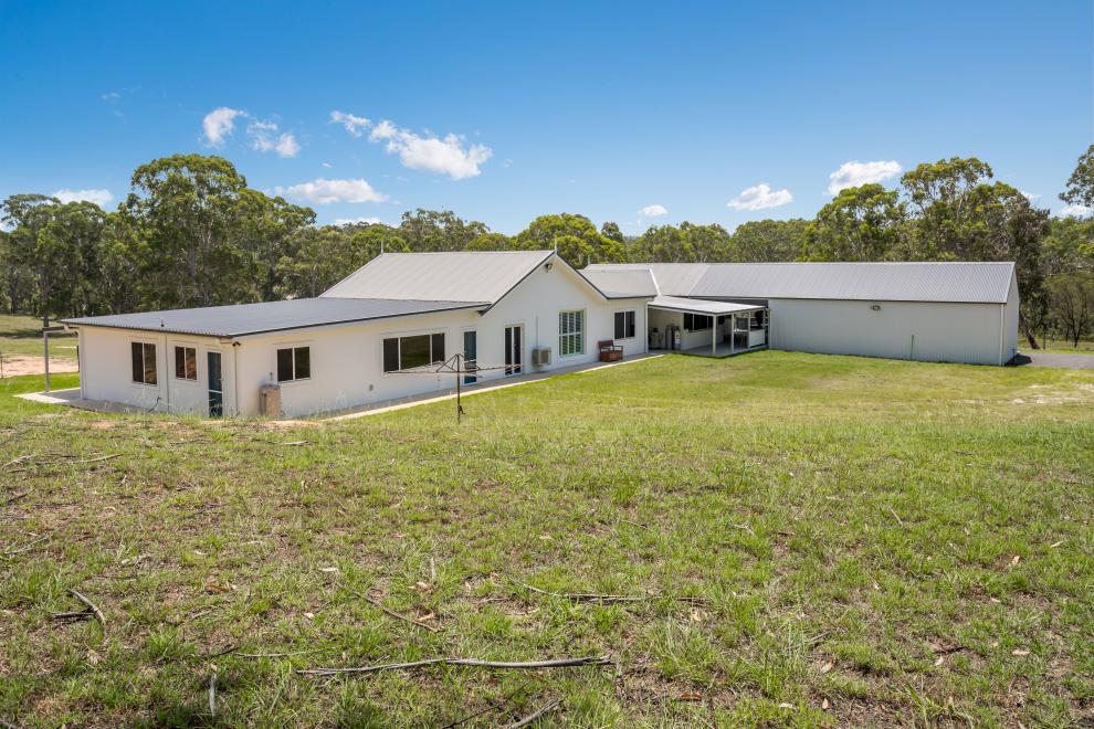 Country Homestead on 44 Acres with Massive Frontage